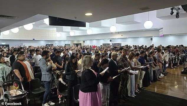 Mayors from Fairfield and Liverpool accused Mr Burke of attempting to secure votes in key Western Sydney electorates (pictured, new citizens and their families in Blacktown)