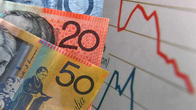 Australian currency is seen next to a wages graph