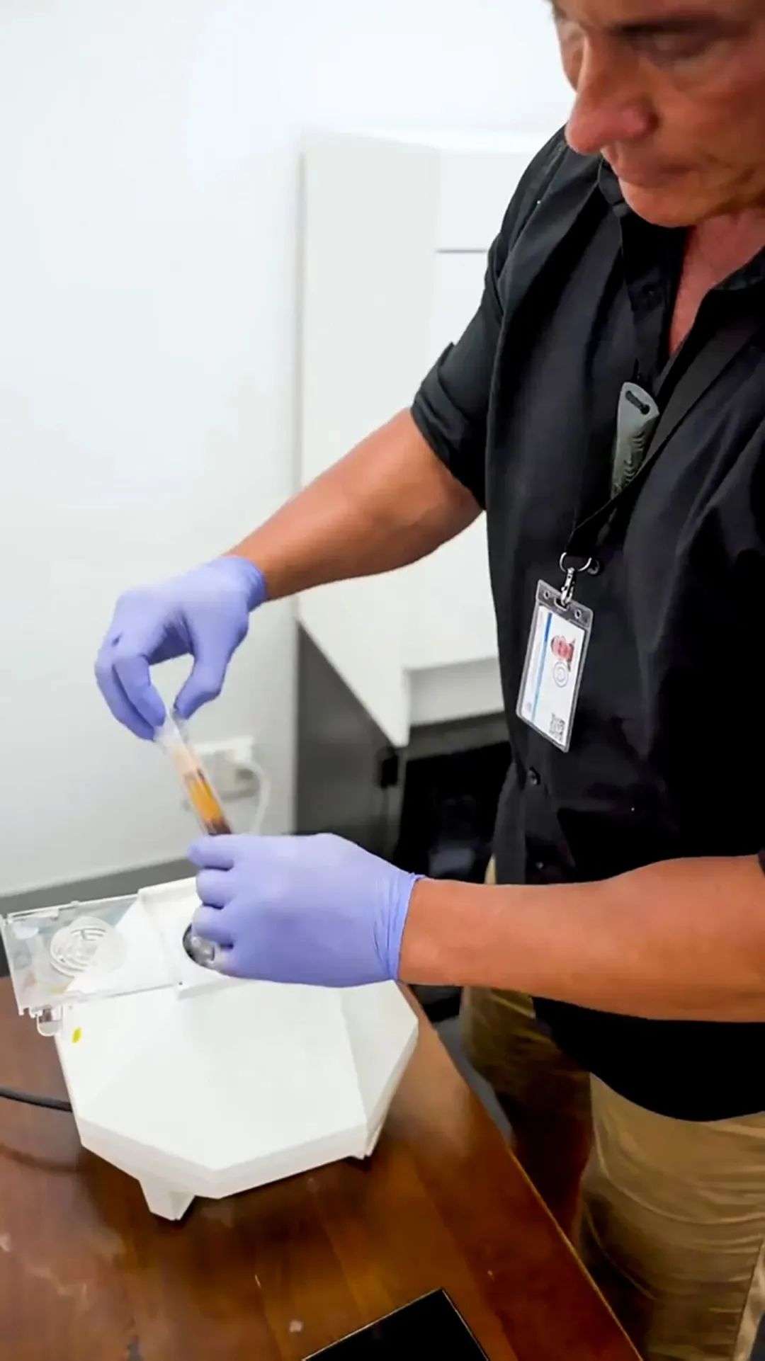 Videos posted by Iain Clegg show him handling a syringe inside an Auckland clinic.