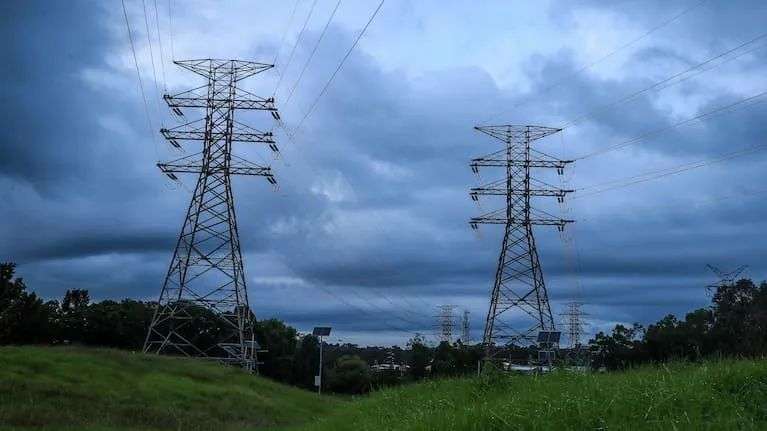 High voltage electricity transmission towers are seen at Warabrook on March 24, 2025 in Newcastle, Australia.