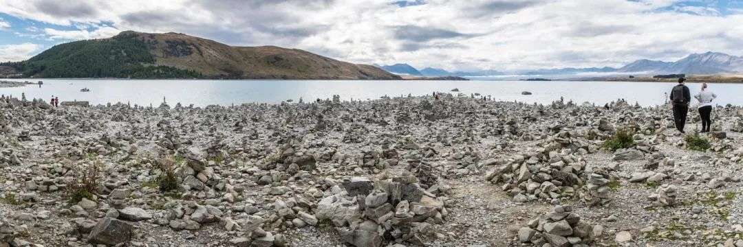 The scale of rock cairns being built by tourists at Lake Tekapo has shocked some. Photo / Shellie Evans