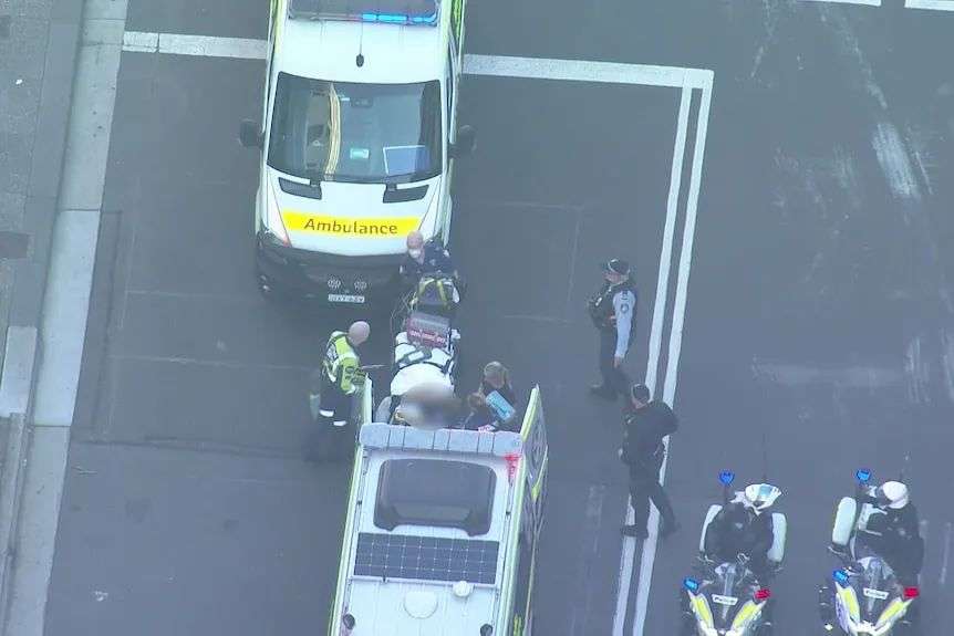Emergency services at Westfield Bondi Junction late on Saturday, April 13, 2024 after six people were killed