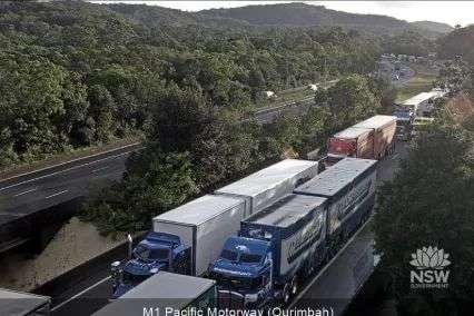 Trucks and cars bumper to bumper on the motorway.