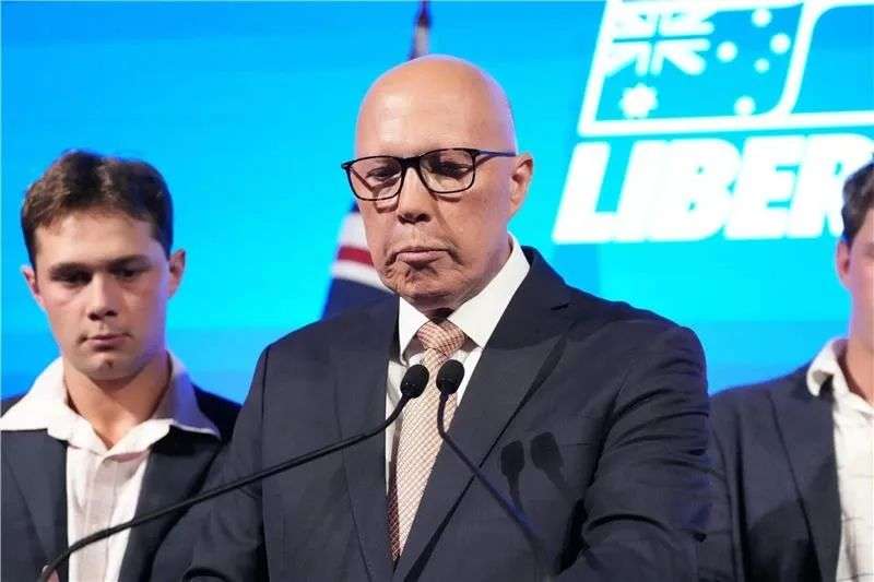 A close up of Peter Dutton on stage.