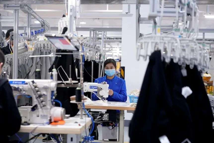 A woman working in a clothing factory.