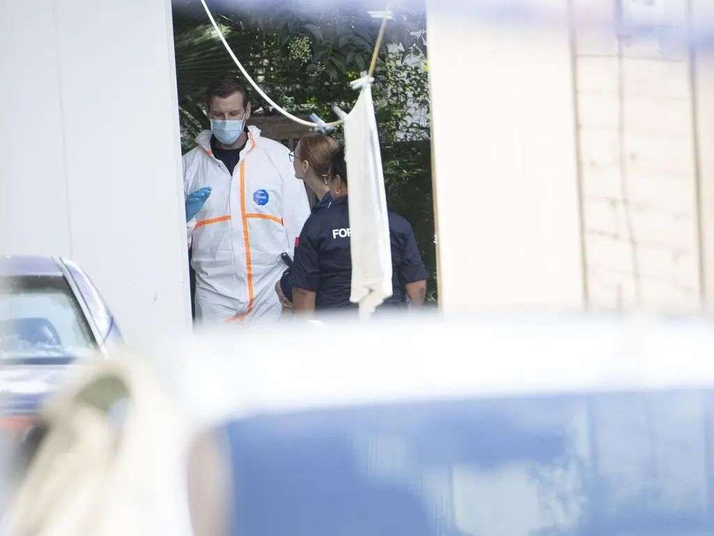 Police at the residence in Homebush West. Picture: Jeremy Piper