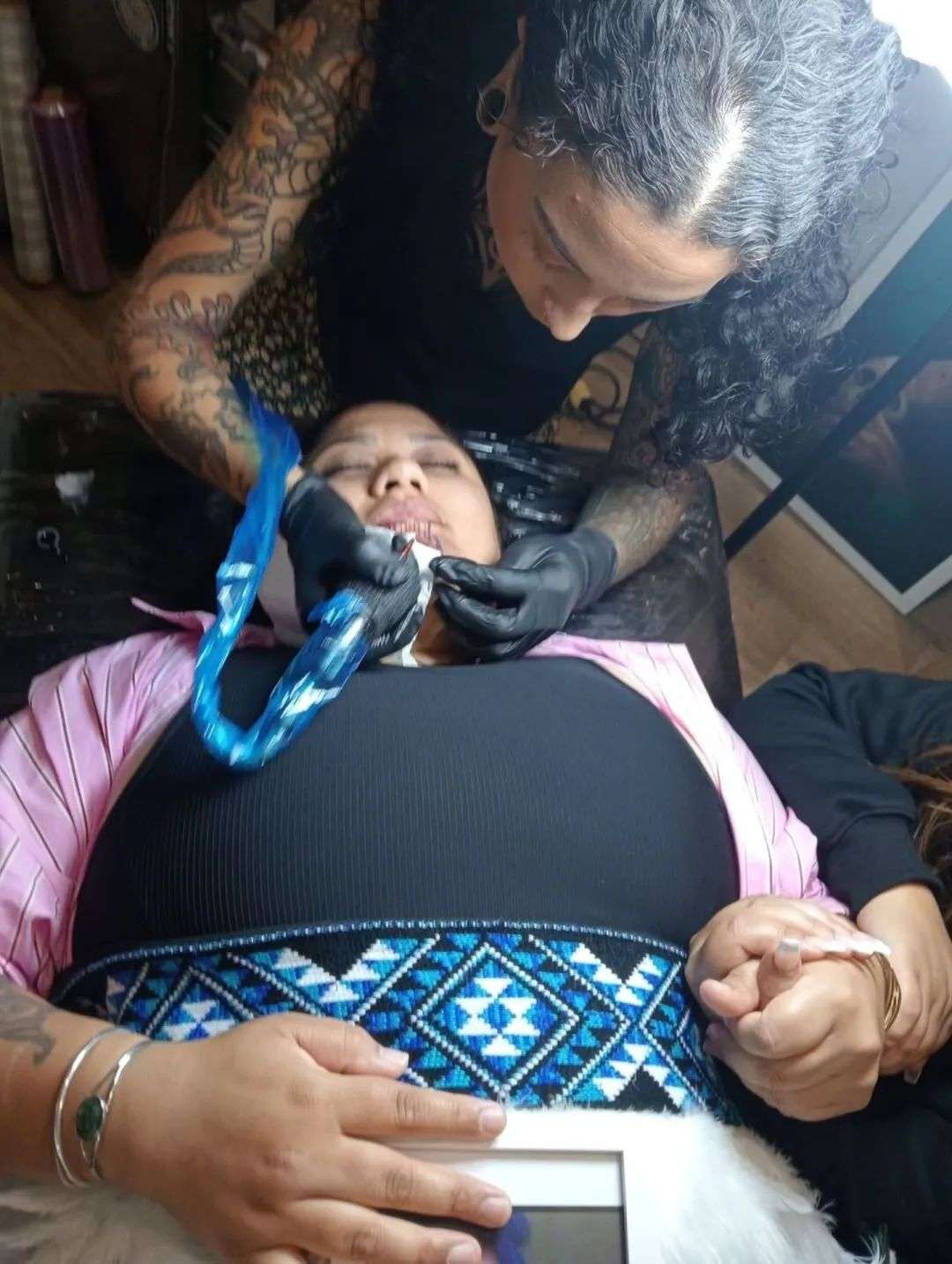 Mary Parkinson Peni getting her moko kauae in January. Image supplied. 14 May 2025.