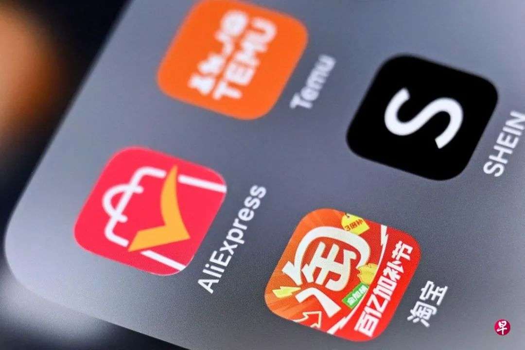 中国电商平台在澳洲逐渐扩大版图。图为一部智能手机上的中国电商平台应用。 （法新社）