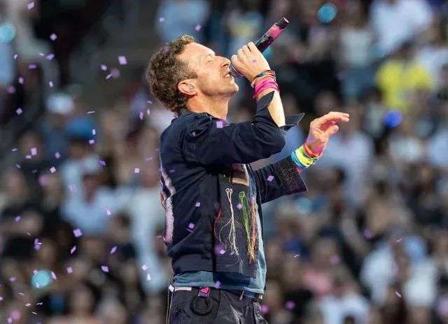 Getty Images Chris Martin on tour with Coldplay in 2025.