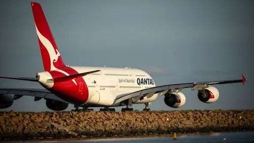A Qantas A380 aircraft passes Gate 20 at The Beach, Mascot on the perimiter of Sydney Airport. Qantas.