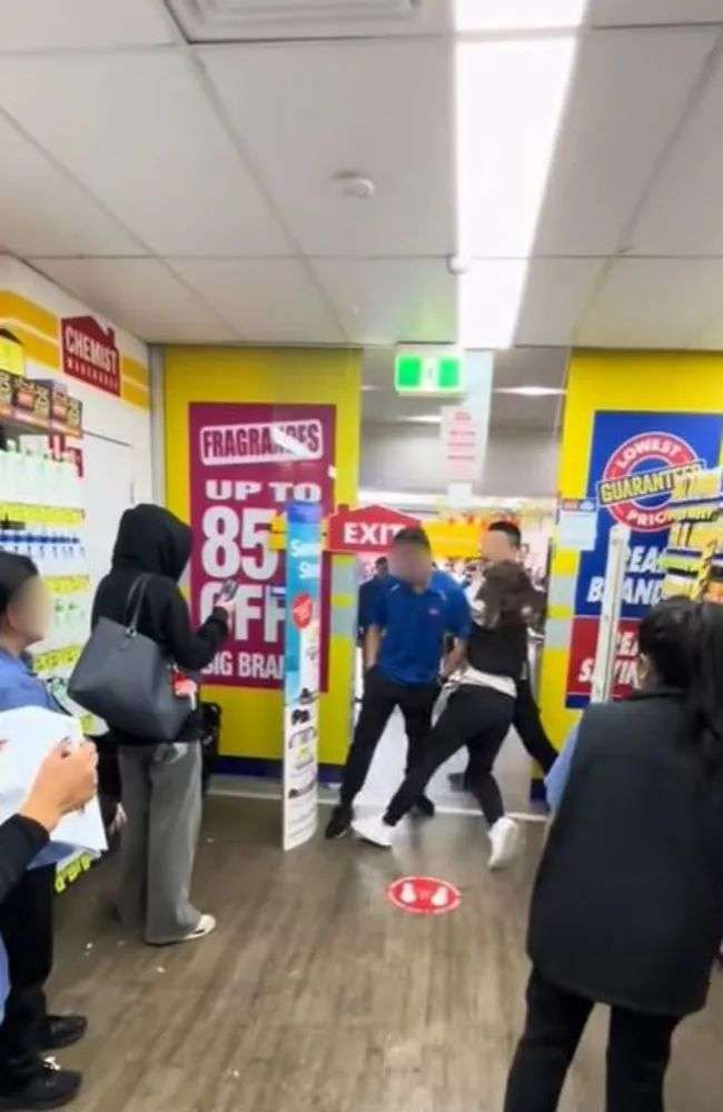 Chemist Warehouse workers are seen detaining an alleged shoplifter. Picture: TikTok/crazynewssydney