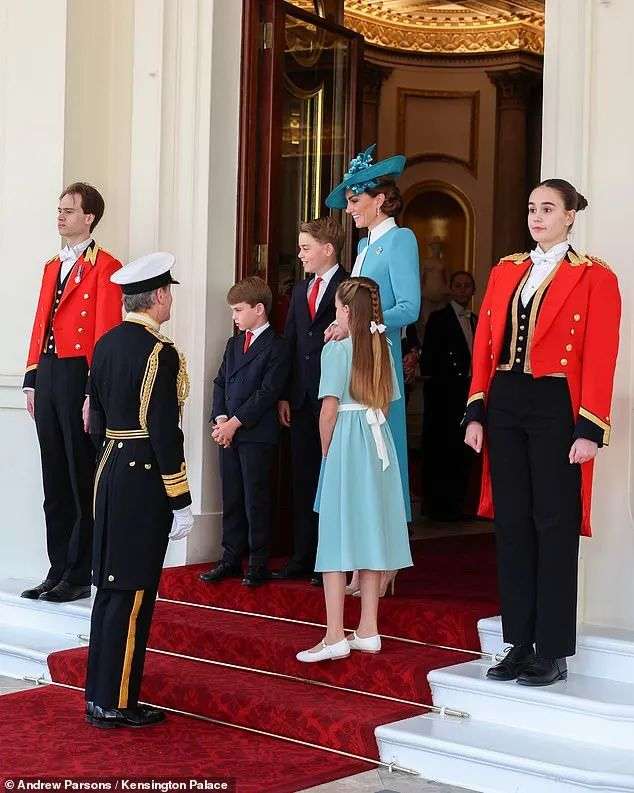 The Wales family wait on the steps of Buckingham Palace for their carriage to arrive