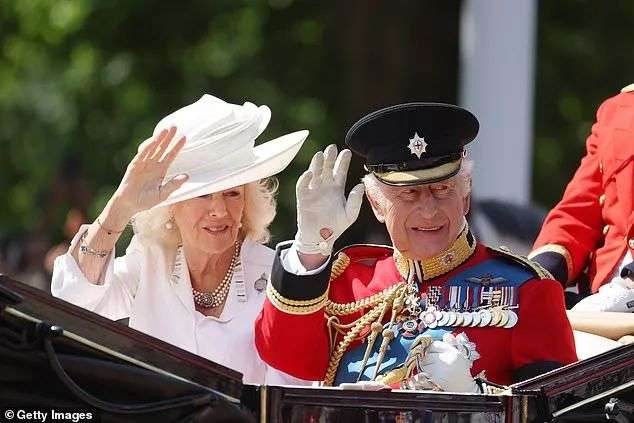 King Charles III and Queen Camilla smile and wave at thousands of royal fans who travelled to London to celebrate the official birthday of the sovereign