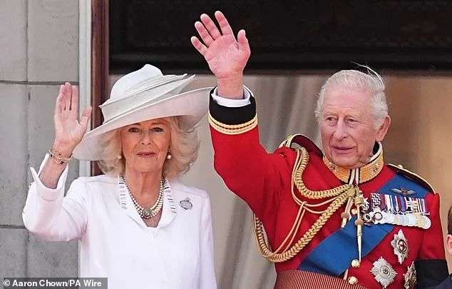 King Charles III and his wife Queen Camilla greet wellwishers from the balcony at Buckingham Palace