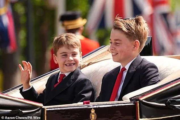 Prince Louis, seven, waves and grins as he attends the Trooping the Colour