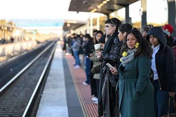 Commuters wait on the platform during the morning peak hour at Tarneit train station in Melbourne’s west.