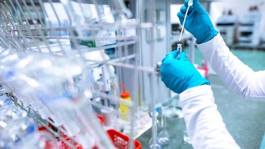 A sample is taken in a laboratory.