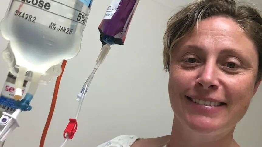 Belinda Kerwin in hospital after being diagnosed with bowel cancer in June last year.