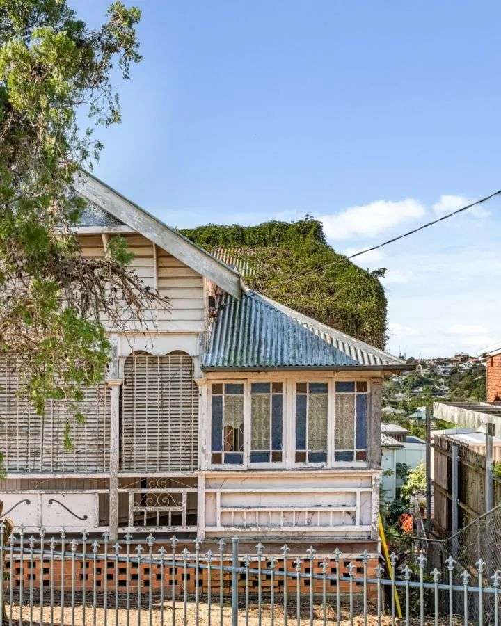 The abandoned Queenslander has many of its period features intact. Photo: Ray White Paddington.