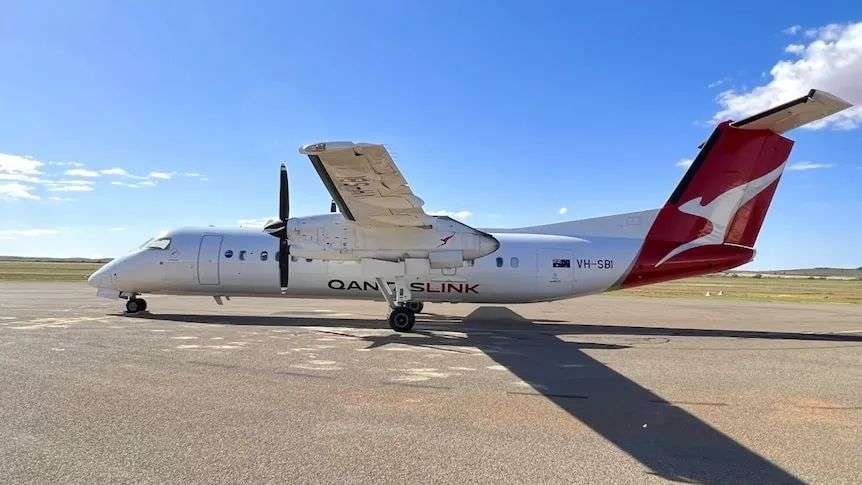 The QantasLink plane on the tarmack at Broken Hill airport.