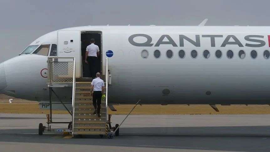 Qantas staff and passengers deal with the aftermath of an emergency landing in Geraldton.