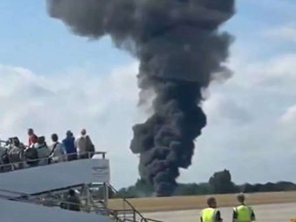 Plumes of black smoke in the sky after the horror crash. Picture: X
