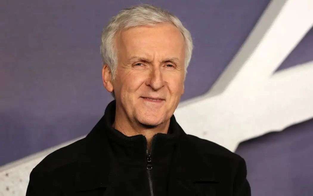 US film director James Cameron poses for photographers upon arrival to attend the world premiere of the film