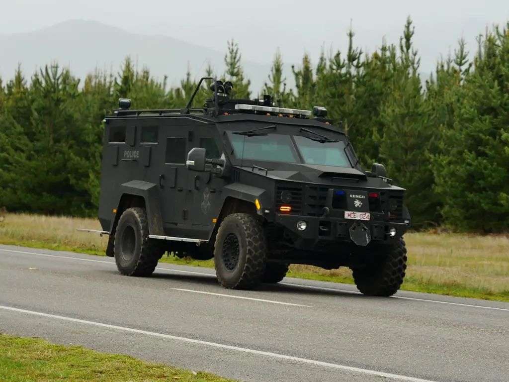 Police in camouflage were seen unloading rifles. Picture: NewsWire / Blair Jackson