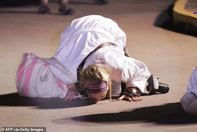 One passenger, Kendall Jenkins, kissed the ground after finally disembarking the 'poop cruise'