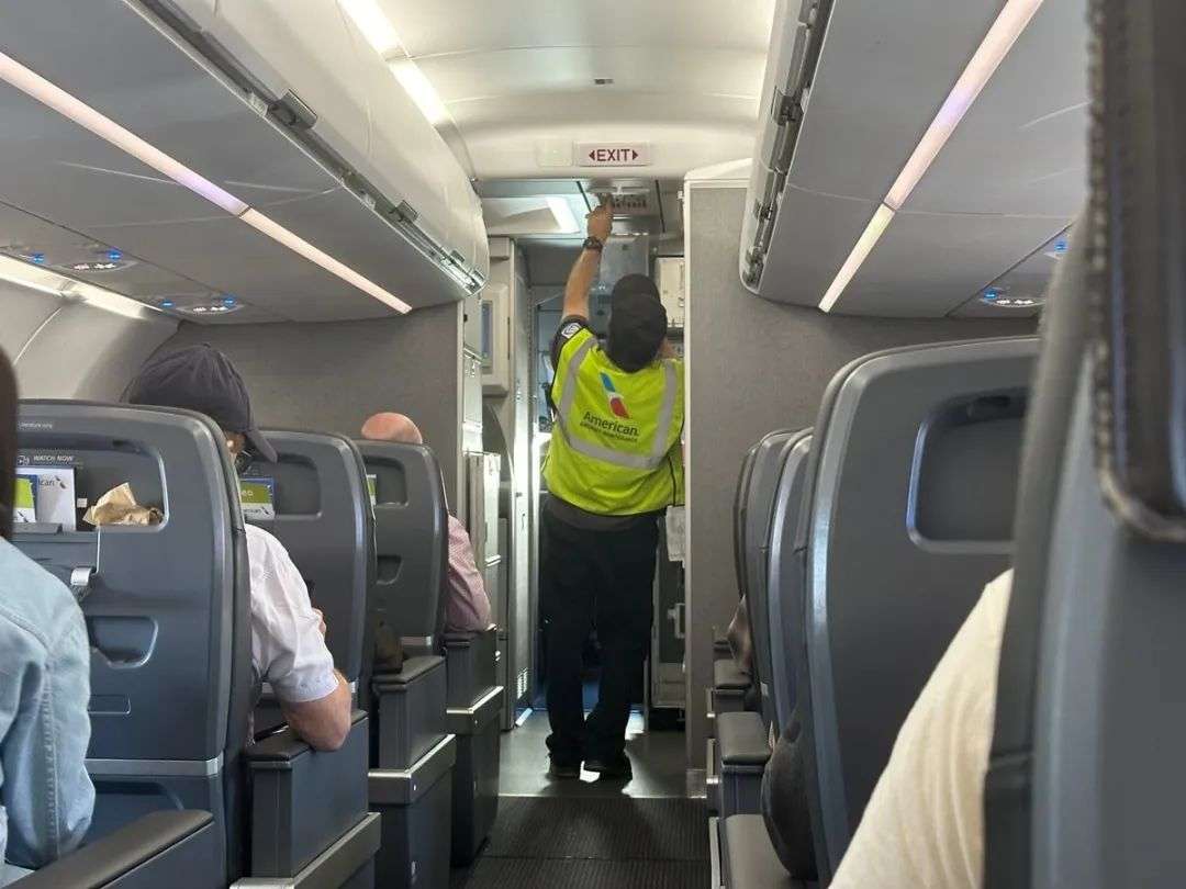Mechanic onboard American Airlines airplane.