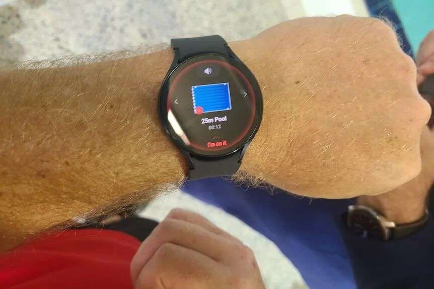 a smart watch on a lifeguard's wrist