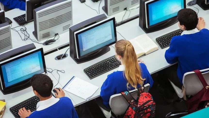 Students working on computers at school
