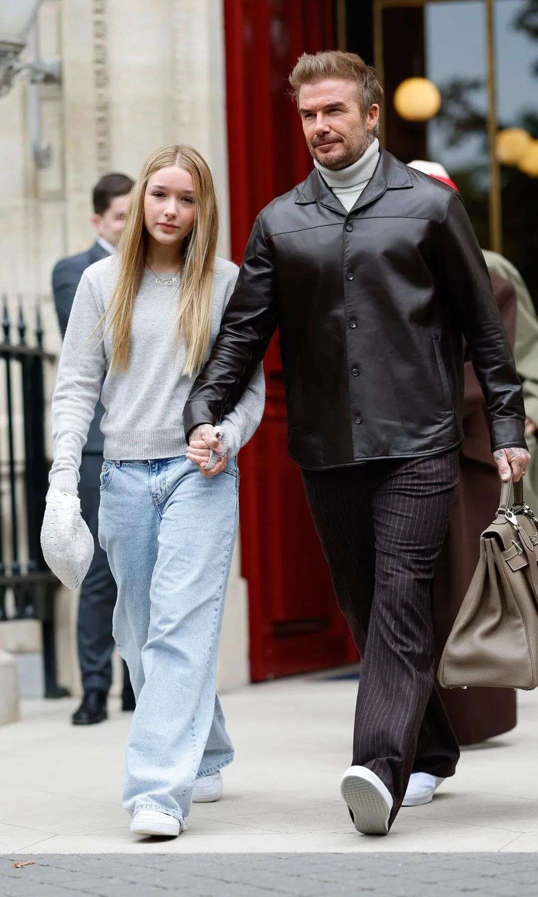 Harper Beckham and David Beckham are seen on September 29, 2024 in Paris, France.