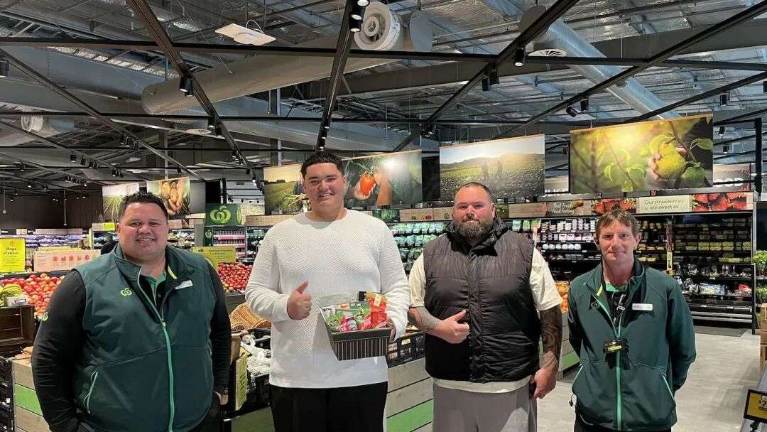Woolworths Fenton St store manager Justin Herewini (left), Colin Dorreen jnr, his father Colin Dorreen snr, and fresh foods manager Clayton Fischer gather for Colin jnr's job interview. Photo / Annabel Reid