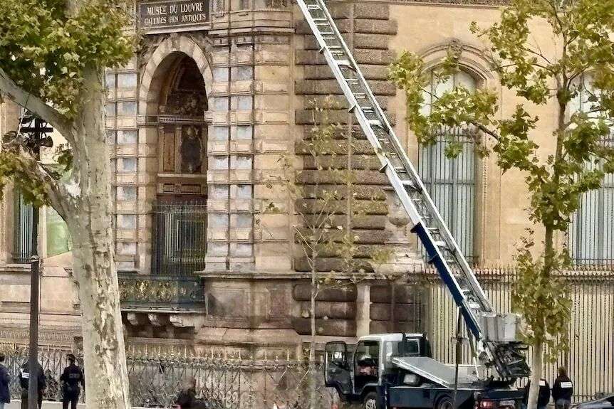 A basket lift outside the Louvre museum.