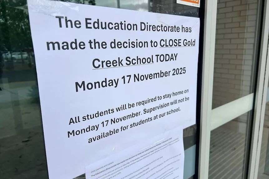 A sign at Gold Creek School stating it is closed due to the asbestos products.