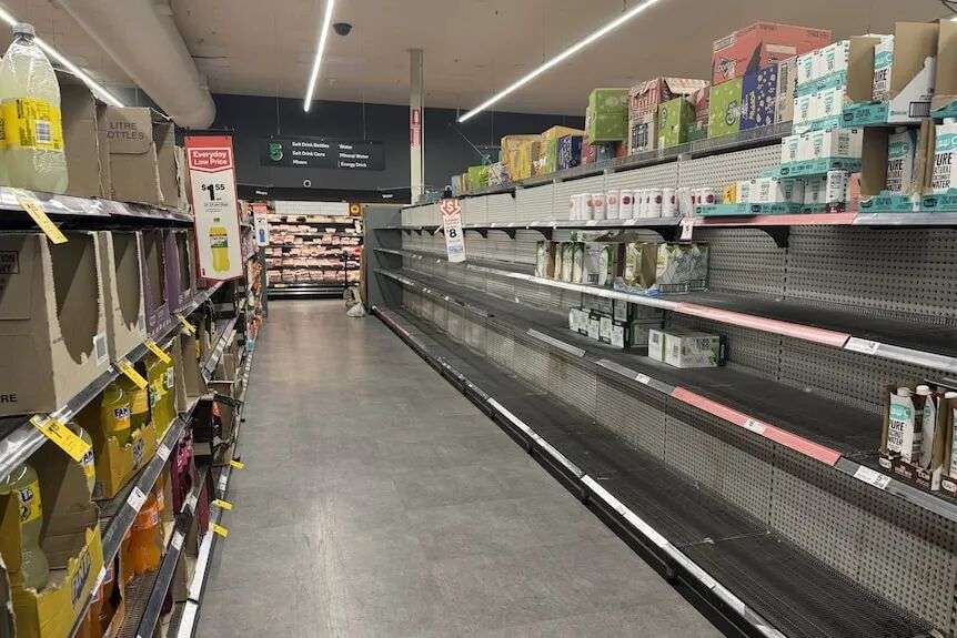 Supermarkets shelves, where water is usually stocked, have been stripped bare.