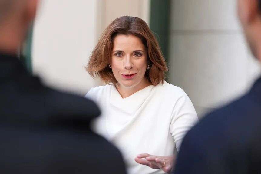 Anika Wells in white.