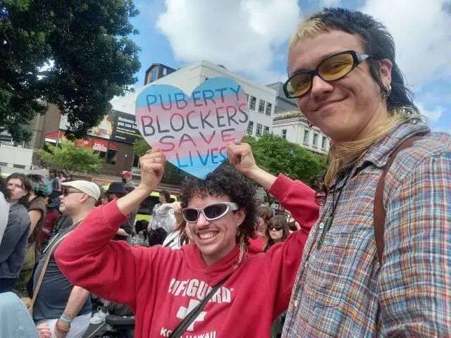 r/newzealand - Around 150 people rally in Wellington in opposition to the government's ban on puberty blockers for transgender youth (20 photos)