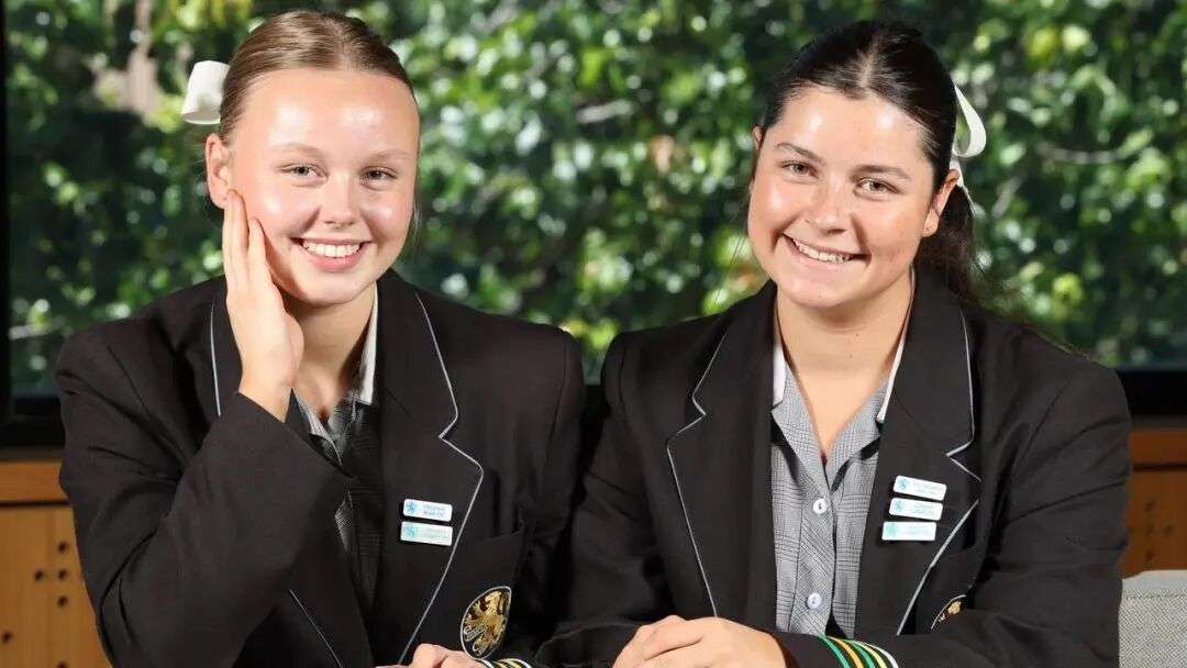 In Adelaide, Wilderness School students Isabella Dolan and Matilda Burns mark their school’s table-topping results. Picture: Emma Brasier