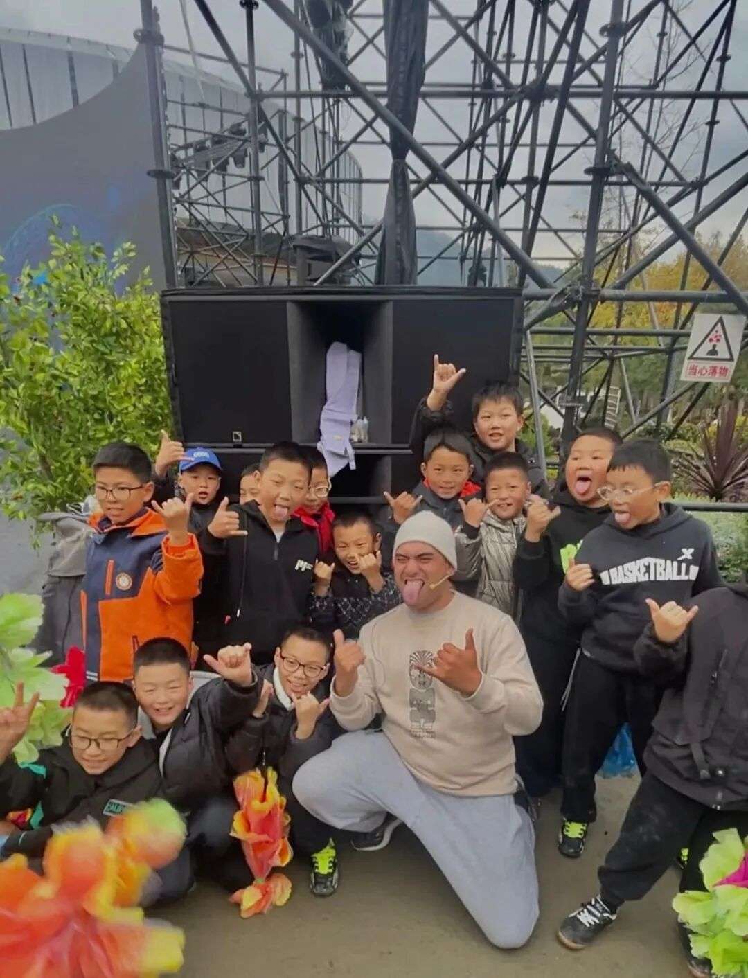 Now and then, children stepped out from the crowd and slipped their hands into the hands of whichever Māori performer they felt drawn to. Photo / Supplied
