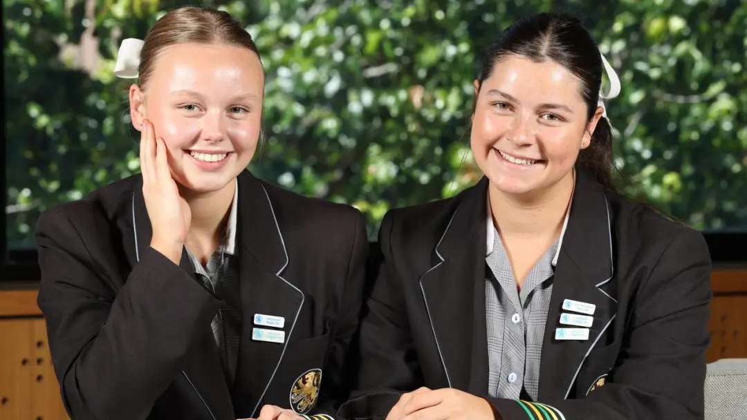 In Adelaide, Wilderness School students Isabella Dolan and Matilda Burns mark their school’s table-topping results. Picture: Emma Brasier