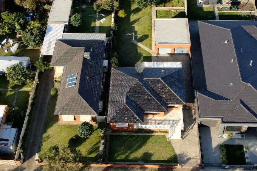 An aerial view of roofs on a housing estate