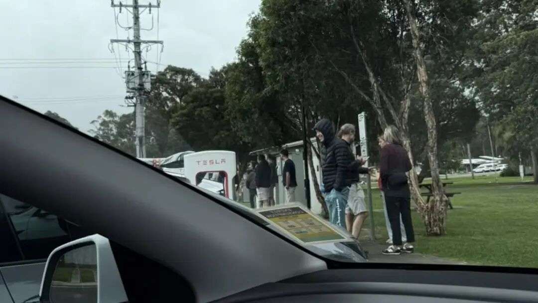 Tesla owners waiting to use Superchargers in Cann River. Picture: Facebook/Tesla Owners Australia