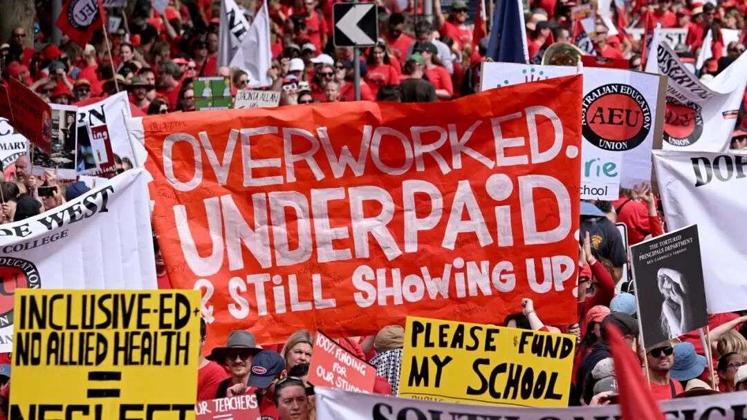 Teachers march through Melbourne's city centre in protest. Picture: William West