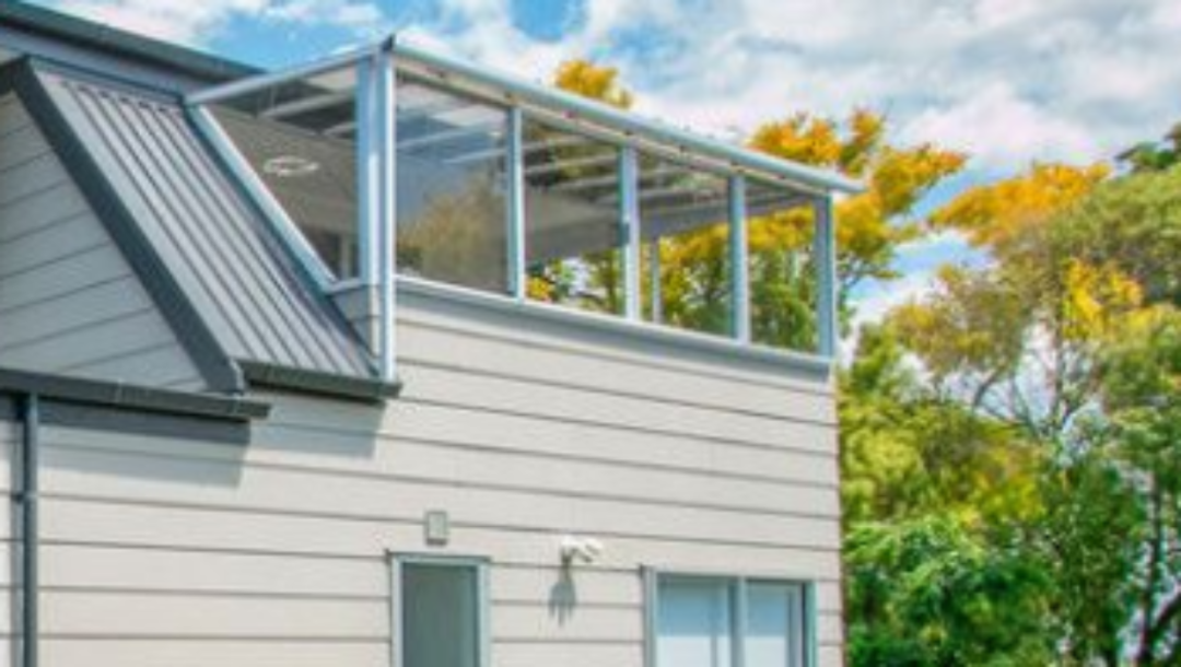 The second storey conservatory was added to the house before the Jaksics bought it.
